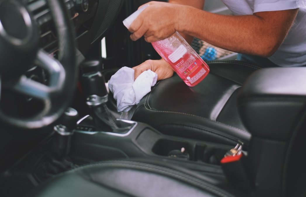 Car detailing in progress with expert surface polishing
